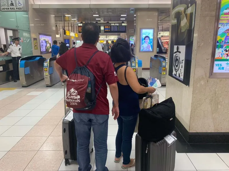 kyoto station with luggage